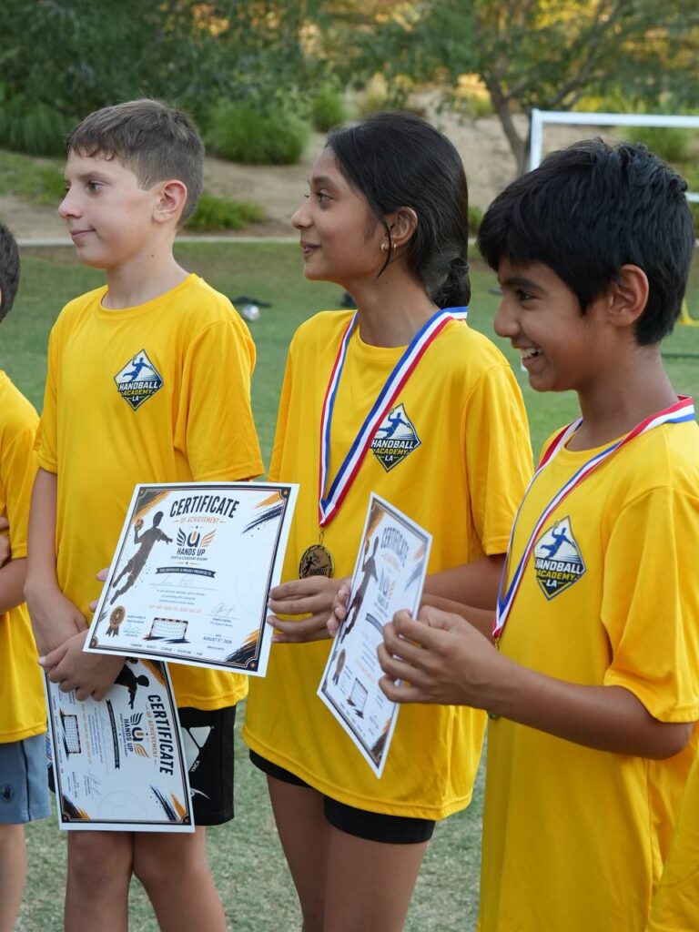 Camp participants with their certificates of achievement